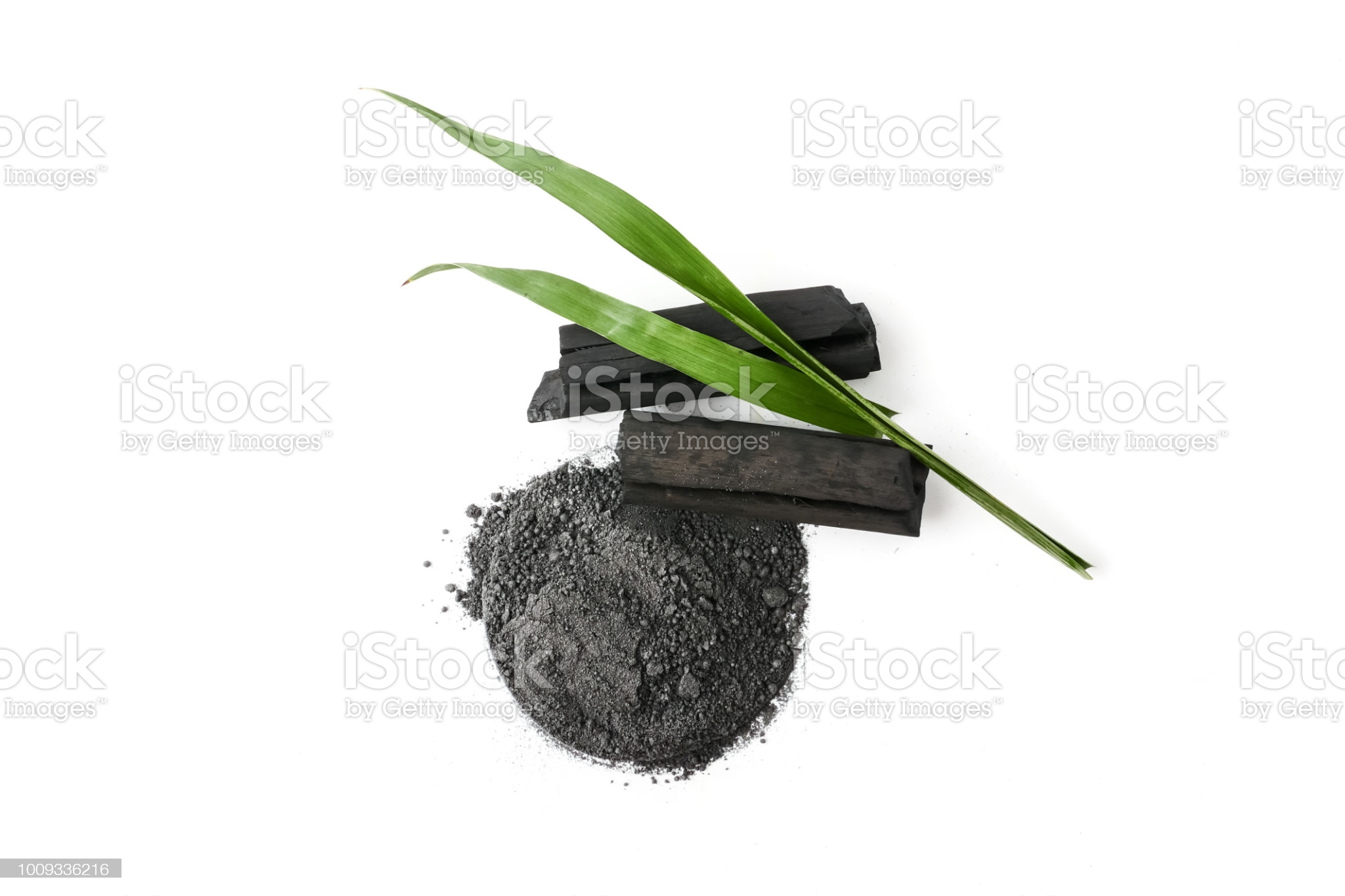 Activated charcoal powder on white background